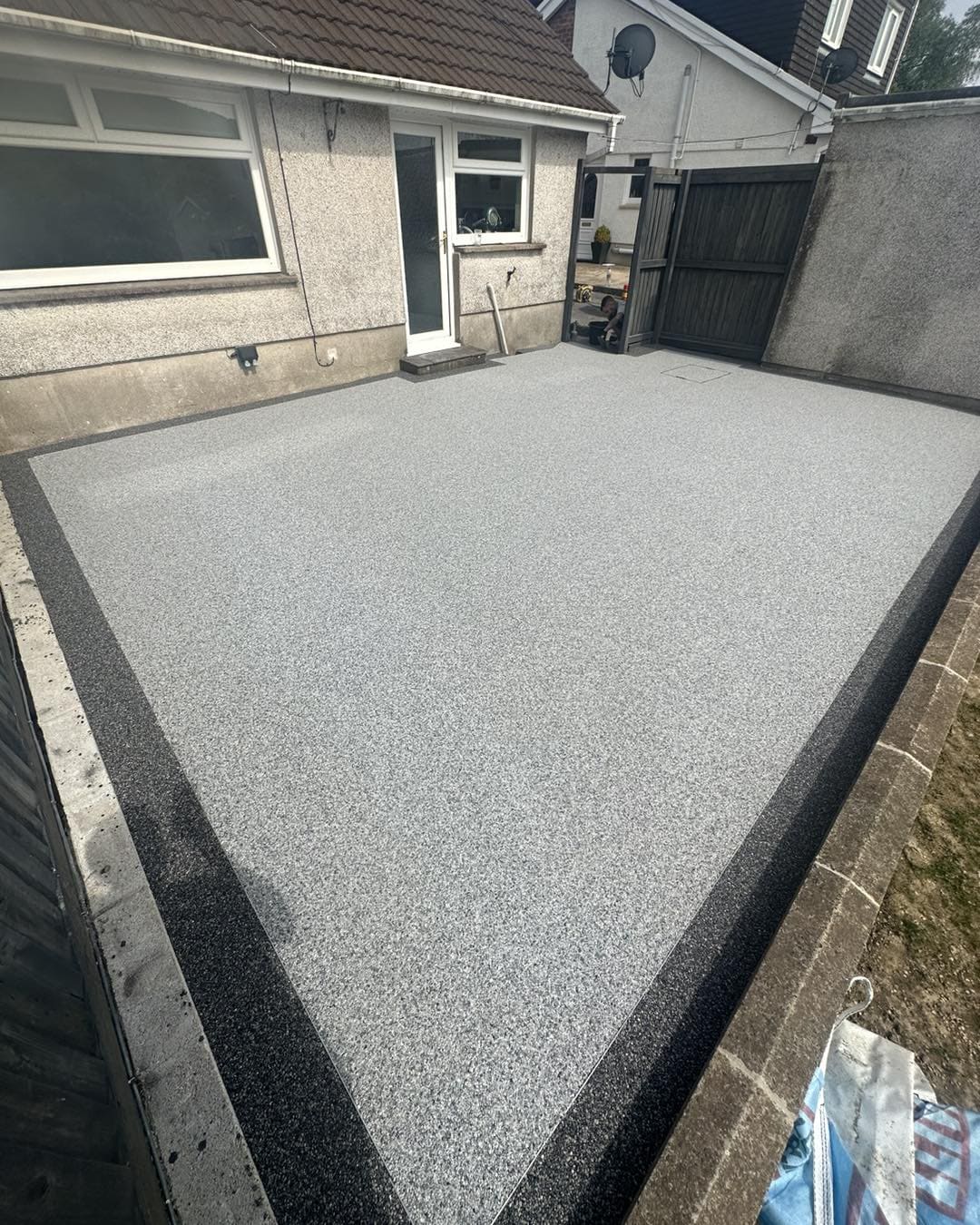 Side view of completed resin bound patio installation in Rhyd-Y-Fro, Pontardawe