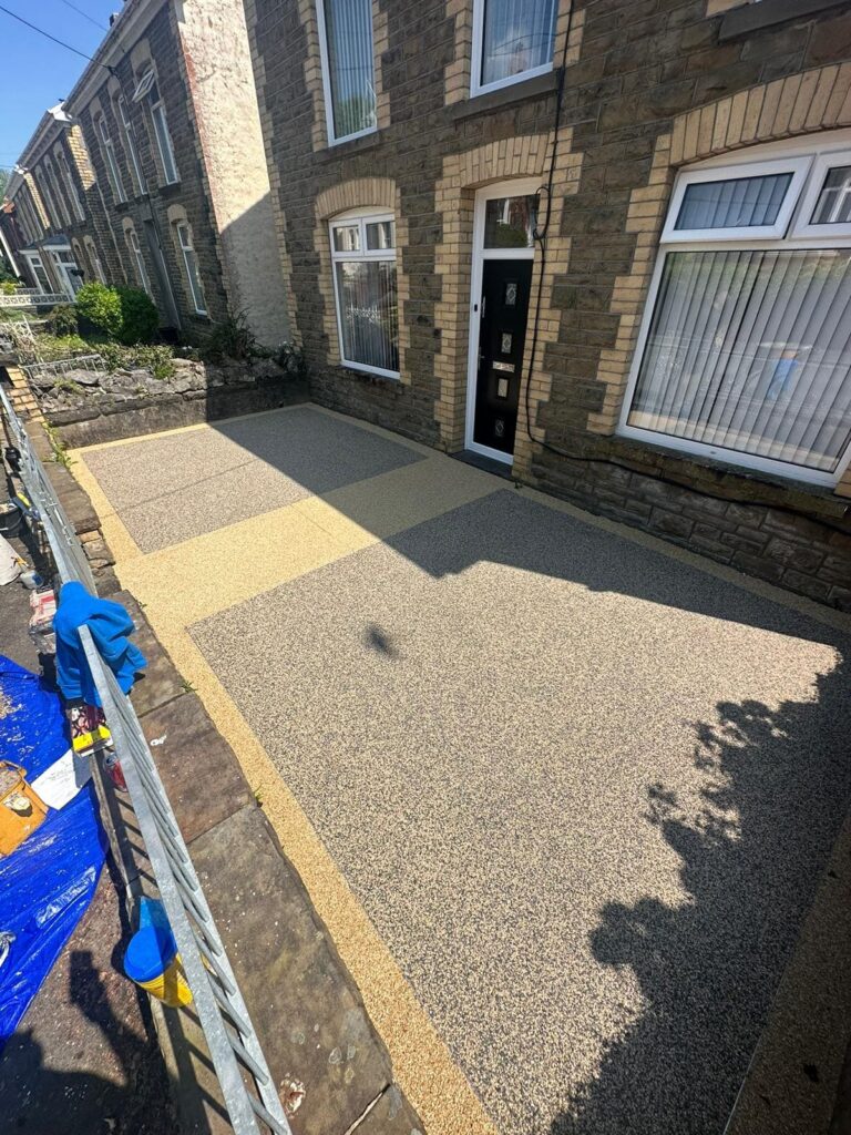 Another side view of new resin bound solution installed in front garden of property in Ystalyfera